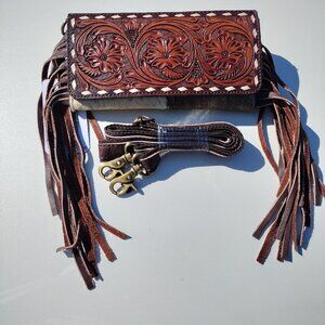 Tooled leather clutch wallet